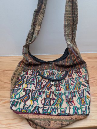 Bolso bandolera de tela con cremallera