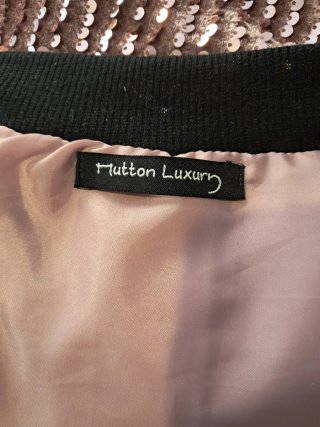 Chaqueta bomber lentejuelas rosa oro
