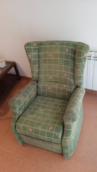 Sillón reclinable de tela verde