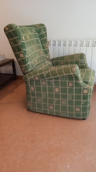 Sillón reclinable de tela verde