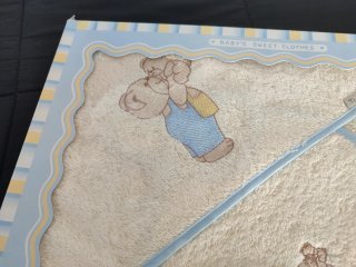 Conjunto capa baño y babero bebé Ti-Tin