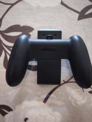 Soporte Joy-Con Nintendo Switch y Deponia