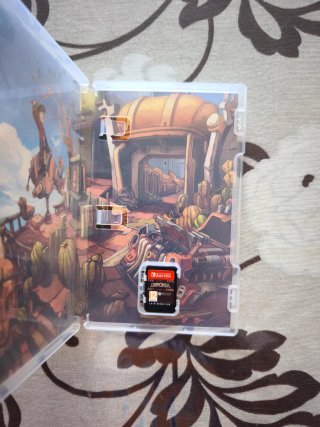 Soporte Joy-Con Nintendo Switch y Deponia