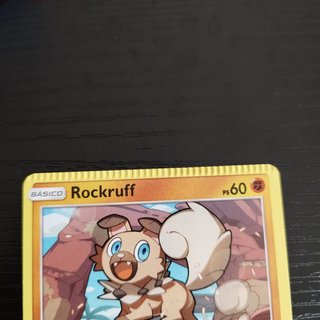 Carta Pokémon Rockruff Error de Corte (Miscut)