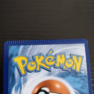 Carta Pokémon Rockruff Error de Corte (Miscut)