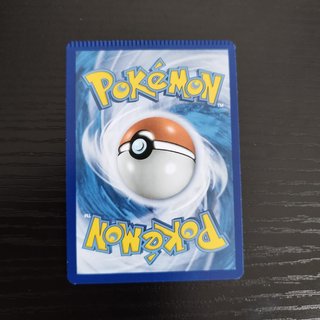 Carta Pokémon Rockruff Error de Corte (Miscut)