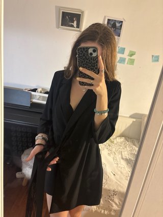 Vestido mono negro con flecos