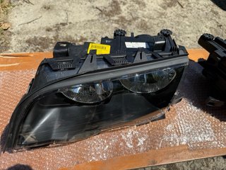 Juego Faros Hella BMW E46