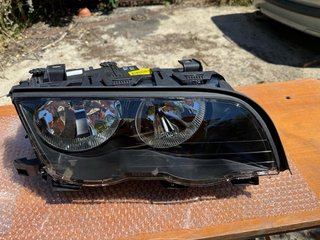 Juego Faros Hella BMW E46