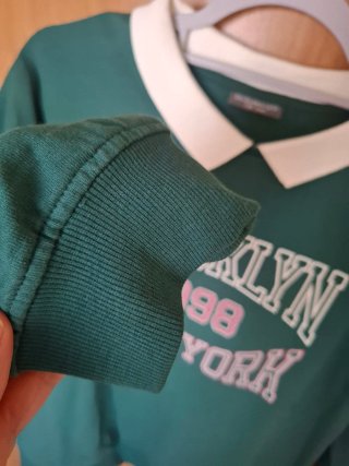 Sudadera verde cuello Peter Pan