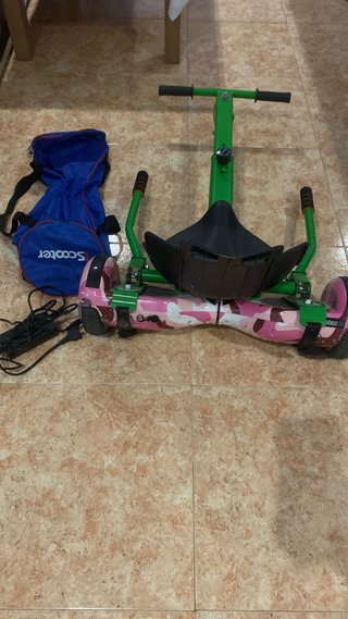 Patinete eléctrico con asiento y bolsa
