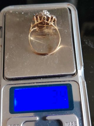 Anillo oro y oro blanco con piedras roto