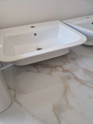 Lavabo de porcelana blanco