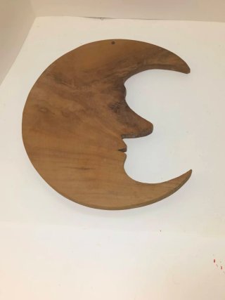 Luna intagliata in vero legno
