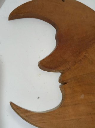 Luna intagliata in vero legno