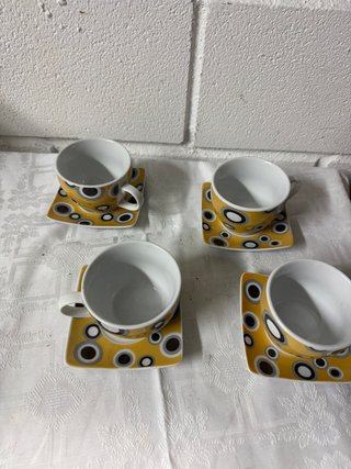 Juego de 4 tazas de café con platos