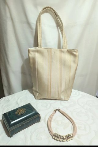 Bolso de hombro rayas doradas. Nuevo sin usar