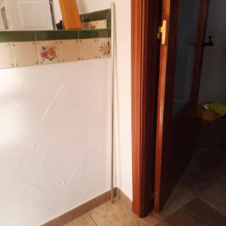 Barra cortina extensible metal, con remates
