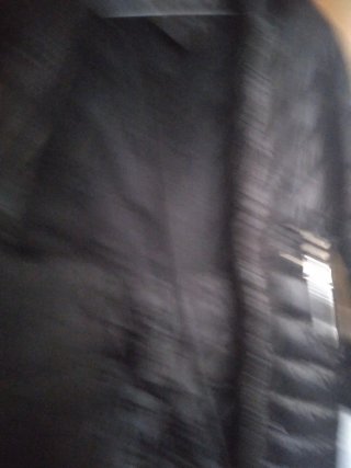 Abrigo negro con capucha y pelo doble cierre