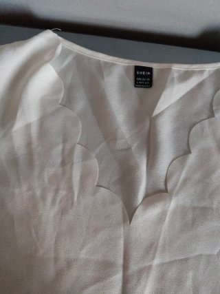 Camisa sin mangas blanca
