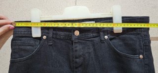 Pantalones Amiri negros con detalles rosas unisex