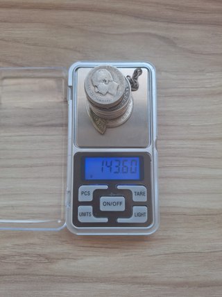 143,61 gramos en Monedas Plata