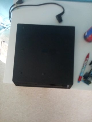 PS4 Pro Negra con cables y cuentas