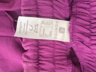 Pantalón corto deportivo morado