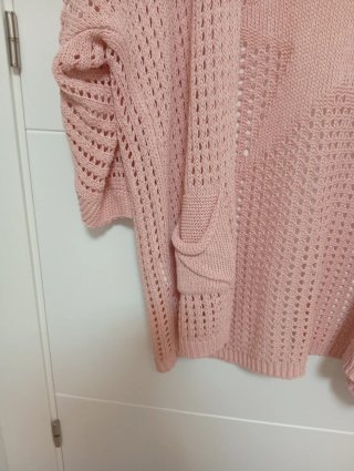 Cárdigan rosa de punto calado