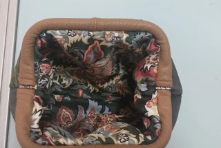 Clutch in tessuto luci con stampa floreale, fodera