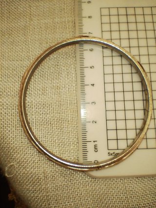 Tris bracciali vintage beige e oro