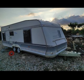 Terreno rústico+caravana