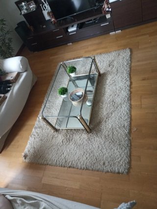 Alfombra beige y marrón