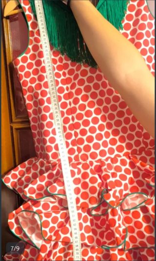 Traje de flamenca blanco con lunares rojos