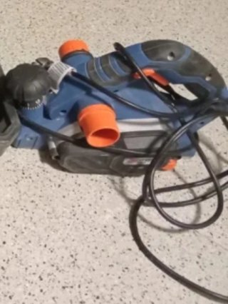 Cepillo Eléctrico Azul y Naranja