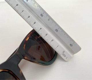 Gafas de sol mujer marrones y verdes.