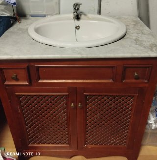 Mueble de baño con lavabo de mármol