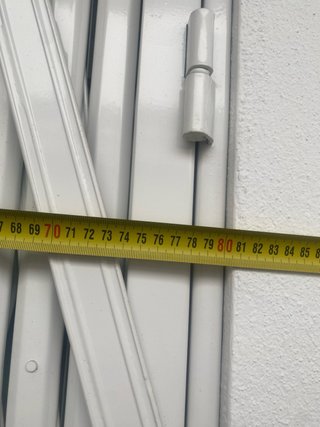 Puerta ballesta plegable y Rejas fijas