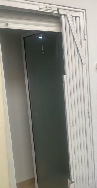 Puerta ballesta plegable y Rejas fijas