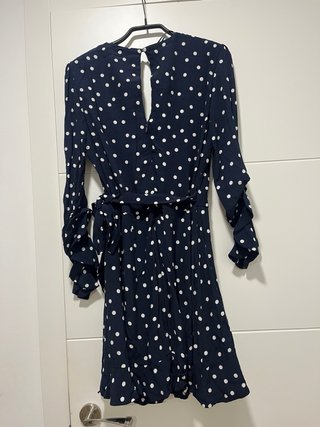 Mono azul marino con sobrefalda lunares
