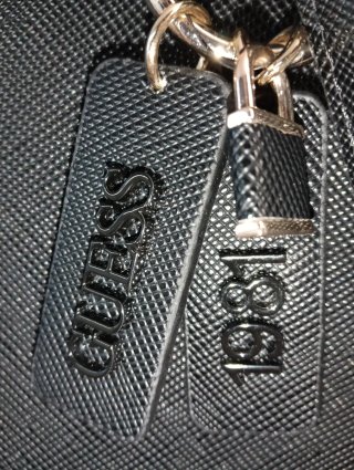 Bolso Guess Negro Usado unas horas para un evento.
