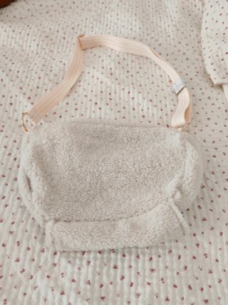 Riñonera borreguito Woman'secret beige NUEVA