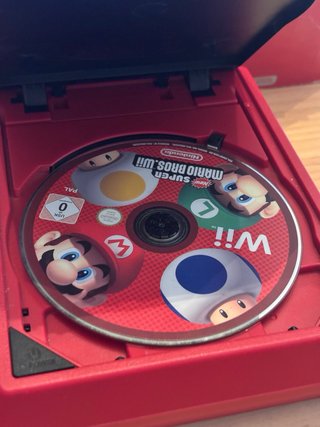 Nintendo Wii Mini Roja + Super Mario Bross