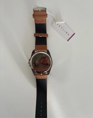 Reloj Skyline Marrón y Plateado
