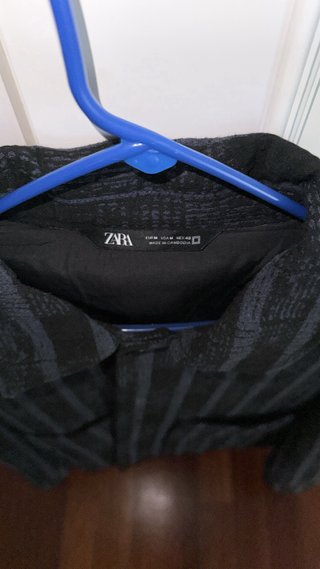 Chaqueta de rayas azul y negra