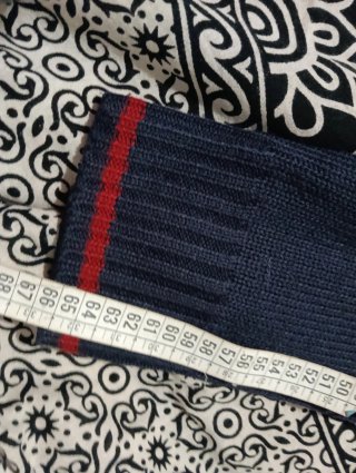 Chaqueta de punto azul y roja hombre