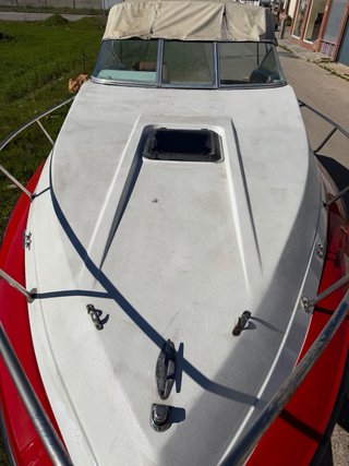 Barco deportivo blanco y rojo(se vende o se cambia