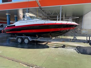 Barco deportivo blanco y rojo(se vende o se cambia