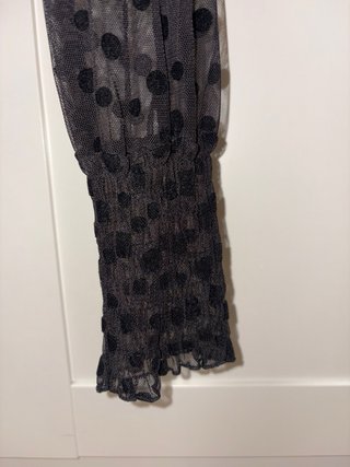 Blusa negra de lunares transparente