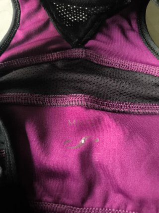 Top deportivo mujer negro y rosa